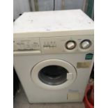 A WHITE ZANUSSI WASHING MACHINE BELIEVED IN WORKING ORDER BUT NO WARRANTY