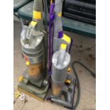 A DYSON DC04 AND A DYSON DC03 VACUUM CLEANER