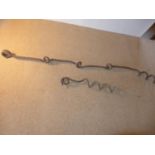 A WORLD WAR I BARBED WIRE SPIRAL STEEL POST, LENGTH 157CM, AND A SMALLER POST, LENGTH 43CM,