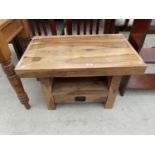 AN INDONESIAN WOOD OCCASIONAL TABLE WITH SINGLE DRAWER - 30" WIDE