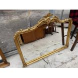 A 19TH CENTURY STYLE GILT FRAMED OVERMANTEL MIRROR, 48" WIDE