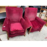 A PAIR OF SPRUNG AND UPHOLSTERED BEECH FRAMED FIRESIDE CHAIRS, ON CABRIOLE FRONT LEGS