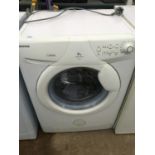 A WHITE 8KG HOOVER WASHING MACHINE BELIEVED IN WORKING ORDER BUT NO WARRANTY