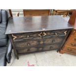 AN EARLY 20TH CENTURY OAK CHEST OF DRAWERS