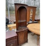 A MAHOGANY CORNER CABINET WITH LOWER DOOR AND UPPER GLASS SHELVING