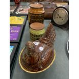 A 'BESWICK' HEN NEST EGG HOLDER AND TWO 'HORNSEA' STORAGE JARS