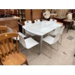 A MODERN OPAQUE GLASS TOPPED DINING TABLE WITH SEVEN WHITE DINING CHAIRS ON CHROME SUPPORTS