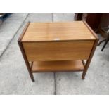 A RETRO TEAK TWO TIER DROP LEAF SERVING TROLLEY