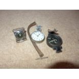A MILITARY G.S.T.P. WATCH, COMPASS AND A SMALL BEDSIDE CLOCK