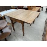 A VICTORIAN PINE DROP LEAF KITCHEN TABLE WITH SINGLE DRAWER