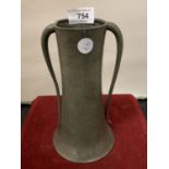 A TWIN HANDLED PEWTER VASE