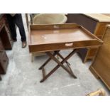 A 19TH CENTURY MAHOGANY BUTLER'S TRAY ON FOLDING STAND