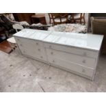 TWO WHITE CHESTS OF THREE DRAWERS AND A WHITE BEDROOM CHAIR
