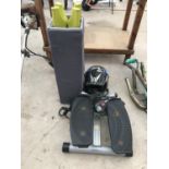 A STEP EXERCISE MACHINE, A MOTOR BIKE HELMET AND A TRAVEL COT