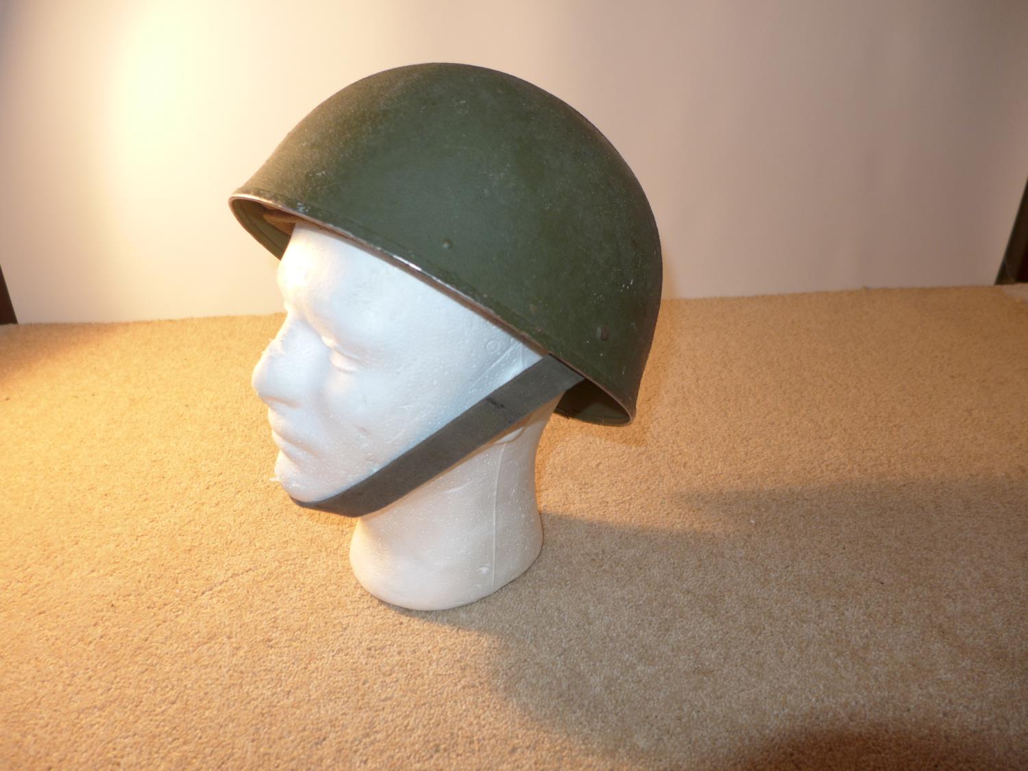 A BRITISH ARMY TANK CREW HELMET AND LINER