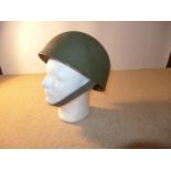 A BRITISH ARMY TANK CREW HELMET AND LINER