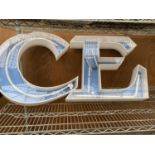 TWO NEON LIGHT UP LETTERS OF A 'C' AND AN 'E' APPROX. 57CM