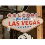 A 'VIVA LAS VEGAS' METAL SIGN