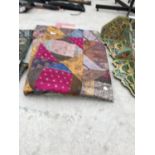 A COLOURFUL PATCH WORK THROW/BLANKET