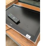 A 23" TECHNIKA TELEVISION WITH REMOTE CONTROL BELIEVED IN WORKING ORDER BUT NO WARRANTY