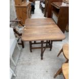 AN EARLY 20TH CENTURY OAK BARLEYTWIST GATELEG TABLE