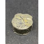 A WHITE METAL PILL BOX MARKED SILVER SCENCES 89 WITH LILY AND PAD DESIGN AMD INSCRIPTION