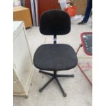 A BLACK SWIVEL OFFICE CHAIR