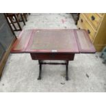 A REPRODUCTION MINIATURE MAHOGANY SOFA TABLE