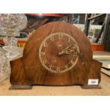 A WOODEN MANTEL CLOCK (A/F)