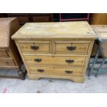 A VICTORIAN OAK GRAINED AND PAINTED CHEST OF TWO SHORT AND TWO LONG DRAWERS