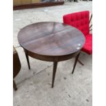 A CIRCULAR 19TH CENTURY MAHOGANY FOLDING TEA TABLE - 36" DIAMETER