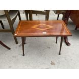 AN INLAID MAHOGANY COFFEE TABLE