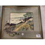 A FRAMED TAPESTRY OF A COASTAL SCENE