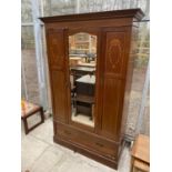 AN EDWARDIAN MAHOGANY AND INLAID MIRROR-DOOR WARDROBE WITH A DRAWER TO THE BASE, 50" WIDE