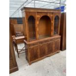 A YEW WOOD BOOKCASE ON BASE 63 INCHES WIDE