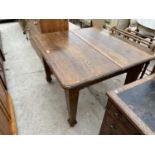 AN EDWARDIAN OAK WIND-OUT DINING TABLE, 42" SQUARE