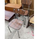 A SET OF FOUR EAMES STYLE KITCHEN CHAIRS