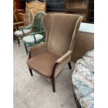 A PARKER KNOLL WING BACK ARMCHAIR