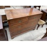 A 19TH CENTURY STYLE MAHOGANY CAMPAIGN CHEST OF TWO SHORT AND TWO LONG DRAWERS WITH RECESSED BRASS