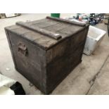 A VINTAGE WOODEN CHEST WITH CONTENTS TO INCLUDE HORSE TACK ETC