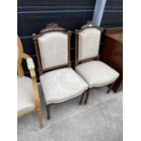 TWO VICTORIAN CARVED WALNUT HALL CHAIRS