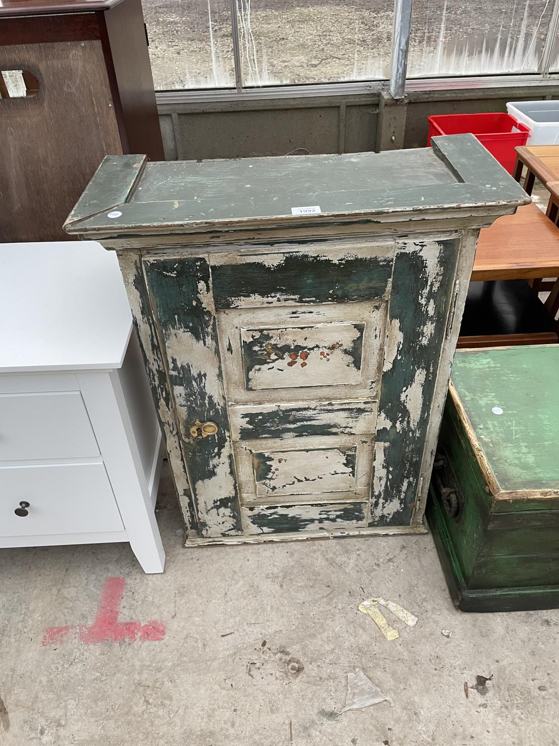 A VICTORIAN PAINTED HANGING CABINET WITH SINGLE PANELLED DOOR, 24.5" WIDE