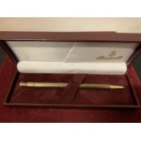 A BOXED INGERSOLL GOLD PLATED PEN