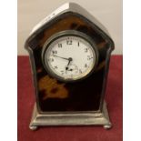 A HALLMARKED SILVER AND TORTOISE SHELL TRAVELLING CLOCK HEIGHT 12CM