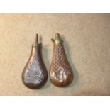TWO COPPER AND BRASS POWDER FLASKS, LENGTH 20CM EACH, ONE MARKED JAMES DIXON & SONS (2)