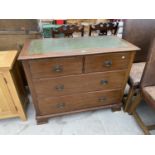 A LATE 19TH CENTURY MAHOGANY CHEST OF TWO SHORT AND TWO LONG DRAWERS ON OGEE FEET WITH INSET LEATHER