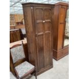 AN EARLY 20TH CENTURY OAK CORNER HALL WARDROBE, 35" WIDE