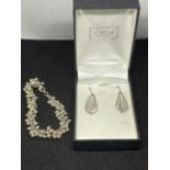 A PAIR OF SILVER EARRINGS AND A BRACELET MARKED 925 WITH A PRESENTATION BOX