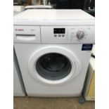 A WHITE BOSCH WASHING MACHINE BELIEVED IN WORKING ORDER BUT NO WARRANTY