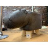 A FAUX LEATHER HIPPO CHILDS FOOT STOOL